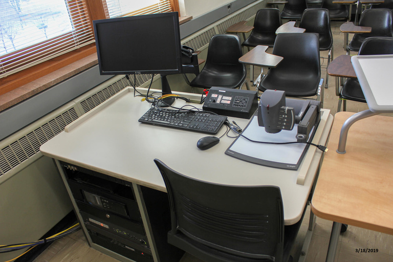 Photo of instructor station in classroom 105 MacLean Hall