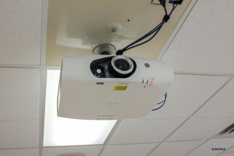 Photo of projector in classroom 207 Phillips Hall