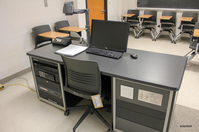 Photo of instructor station in classroom 207 Phillips Hall