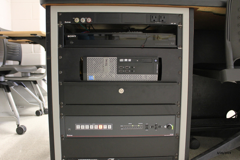 Photo of technology rack in classroom 207 Phillips Hall