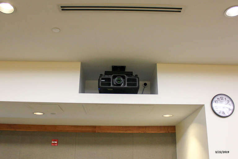 Photo of projector in auditorium 1505 Seamans Center